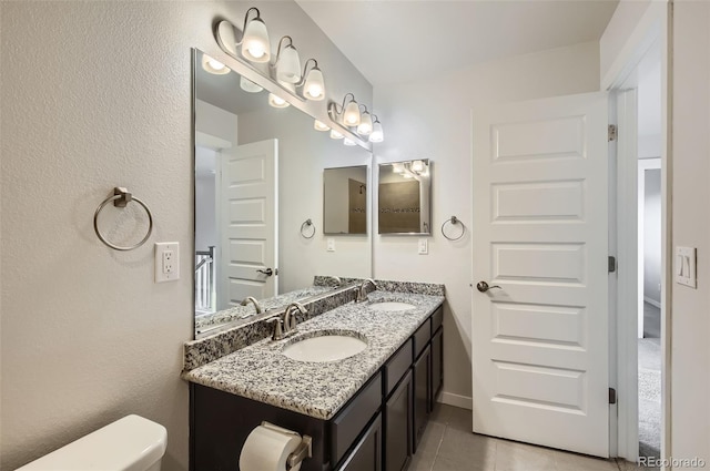 1464 Moraine Valley Dr, Severance, CO 80550 - full bathroom with double vanity and tile patterned floors