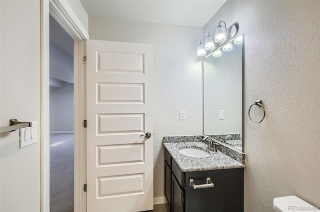 1464 Moraine Valley Dr, Severance, CO 80550 - bathroom featuring vanity and toilet