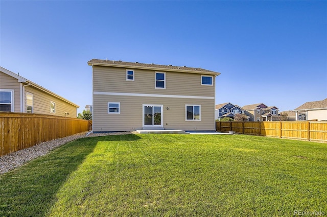 1464 Moraine Valley Dr, Severance, CO 80550 - rear view of house with a patio and a fenced backyard