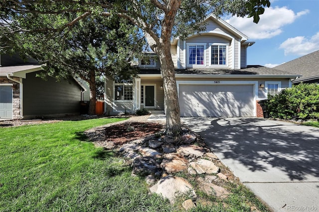 5415 Spruce Ave, Castle Rock, CO 80104 - traditional home featuring driveway, a front yard, and a garage