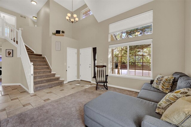 5415 Spruce Ave, Castle Rock, CO 80104 - carpeted living area with a towering ceiling, stairway, a chandelier, and plenty of natural light