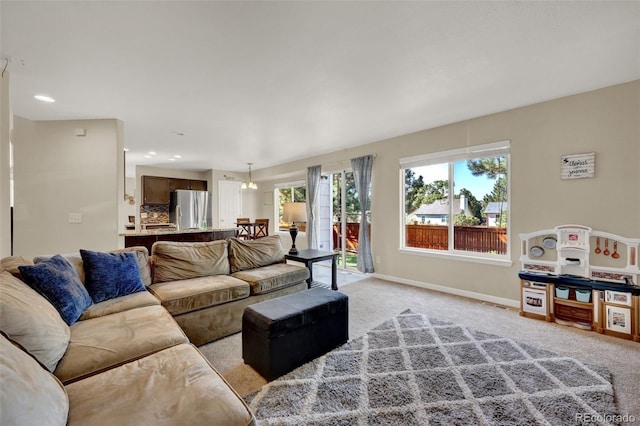 5415 Spruce Ave, Castle Rock, CO 80104 - living room featuring light colored carpet, plenty of natural light, and recessed lighting