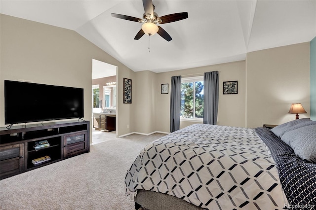 5415 Spruce Ave, Castle Rock, CO 80104 - carpeted bedroom with vaulted ceiling, multiple windows, ensuite bathroom, and ceiling fan