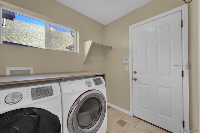 5415 Spruce Ave, Castle Rock, CO 80104 - laundry area with separate washer and dryer and light tile patterned floors