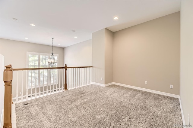 10311 Belvedere Ln, Lone Tree, CO 80124 - unfurnished room featuring carpet flooring, a chandelier, baseboards, and recessed lighting