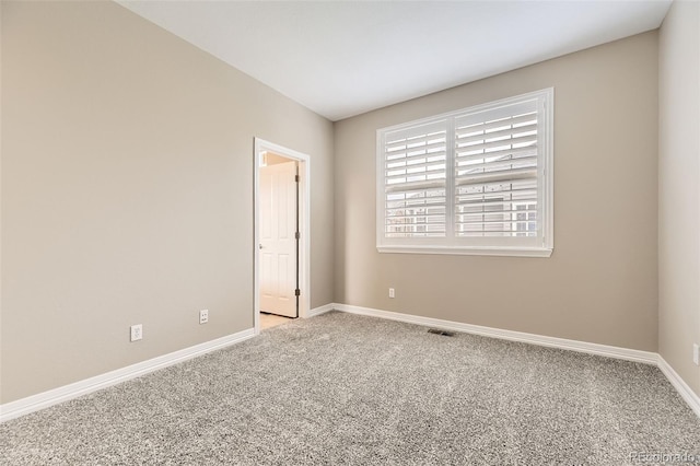 10311 Belvedere Ln, Lone Tree, CO 80124 - carpeted spare room featuring baseboards