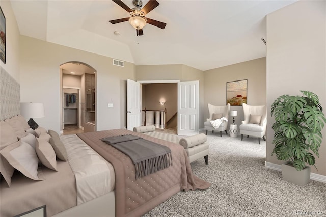 10311 Belvedere Ln, Lone Tree, CO 80124 - carpeted bedroom featuring arched walkways, ensuite bath, lofted ceiling, and ceiling fan