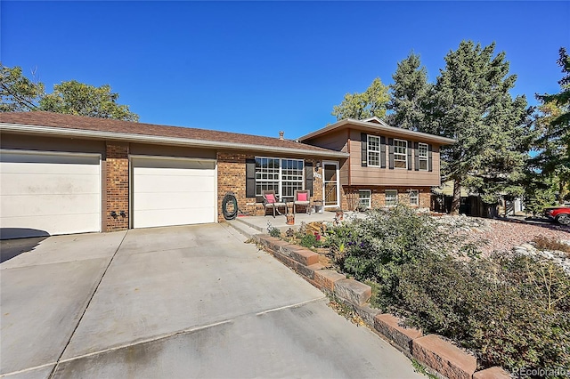 split level home with a garage