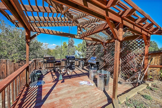 wooden deck featuring a pergola