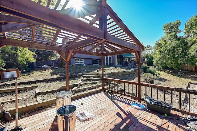 wooden deck featuring a pergola