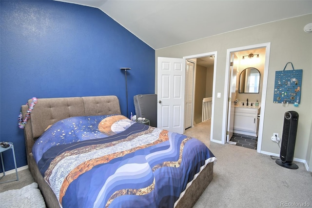 8022 S Columbine Ct, Centennial, CO 80122 - bedroom featuring carpet floors, lofted ceiling, and ensuite bath