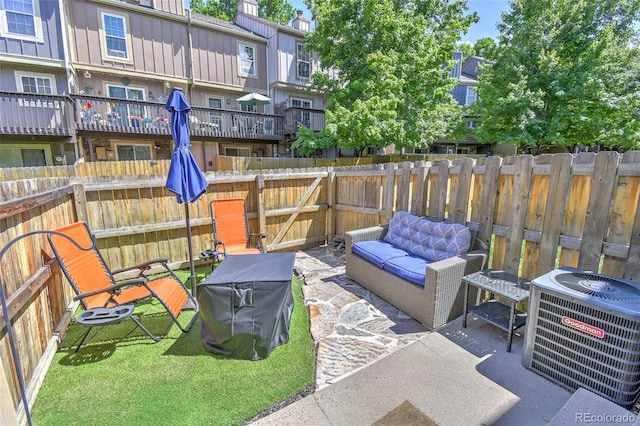 8022 S Columbine Ct, Centennial, CO 80122 - fenced backyard with a patio area and outdoor lounge area