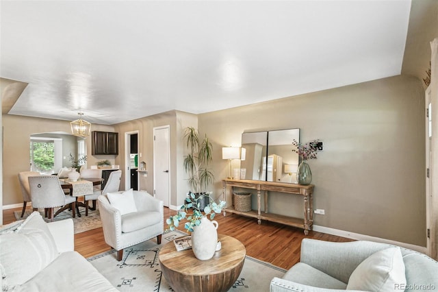 1060 S Harrison St, Denver, CO 80209 - living area featuring baseboards and light wood-style flooring