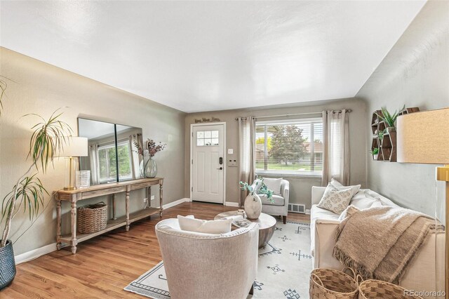 1060 S Harrison St, Denver, CO 80209 - living area featuring wood finished floors and baseboards