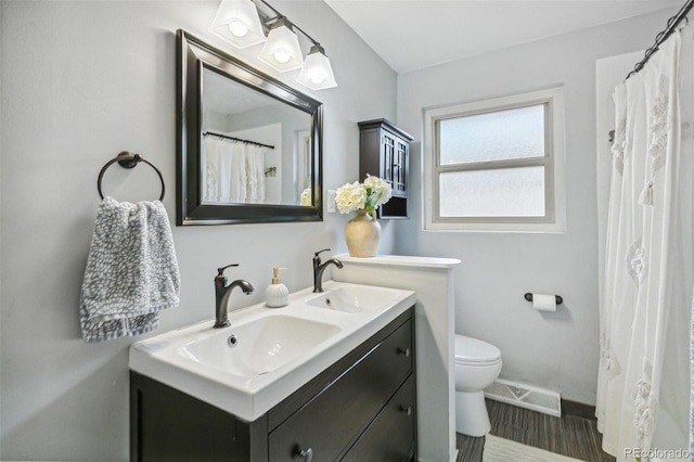 1060 S Harrison St, Denver, CO 80209 - full bath featuring double vanity and toilet