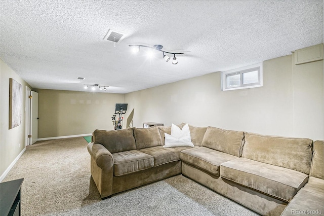 1060 S Harrison St, Denver, CO 80209 - living room with track lighting, carpet floors, and a textured ceiling