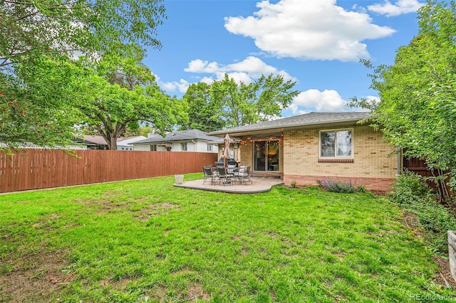 1060 S Harrison St, Denver, CO 80209 - rear view of house with brick siding and a patio
