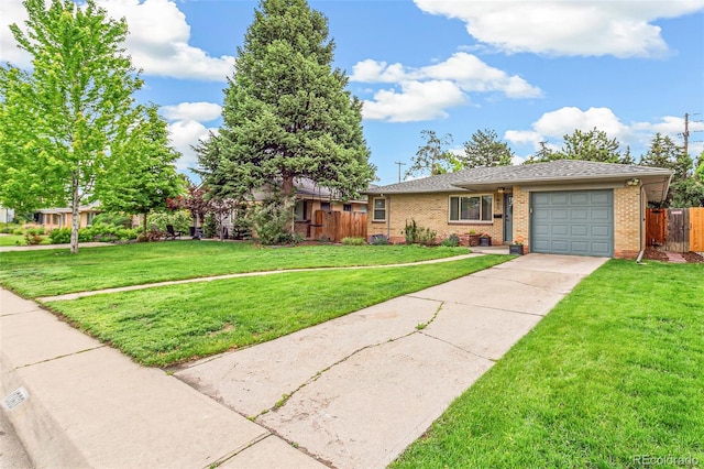 1060 S Harrison St, Denver, CO 80209 - view of front of house with an attached garage, brick siding, and concrete driveway