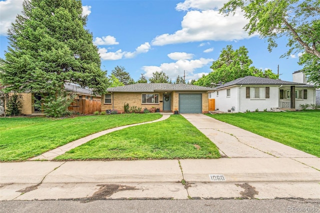 1060 S Harrison St, Denver, CO 80209 - ranch-style house with driveway, an attached garage, brick siding, and a chimney