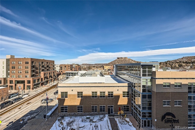 view of building exterior featuring a mountain view