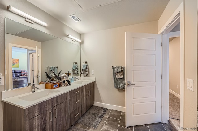 bathroom with vanity and tile patterned flooring