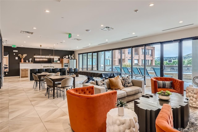 living room featuring light parquet flooring