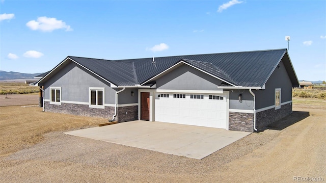 view of front of home featuring a garage