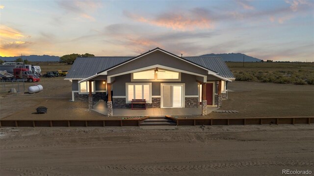 view of front of home with a mountain view