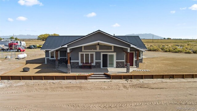 view of front of property featuring a mountain view