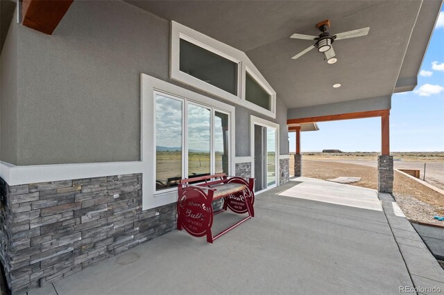 view of patio with ceiling fan