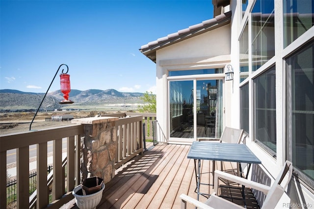 15194 W Washburn Ave, Lakewood, CO 80228 - wooden terrace featuring a mountain view