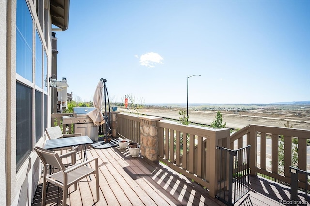 15194 W Washburn Ave, Lakewood, CO 80228 - wooden terrace with area for grilling