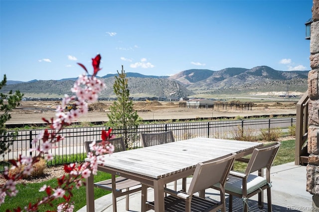 15194 W Washburn Ave, Lakewood, CO 80228 - view of patio / terrace featuring a mountain view and outdoor dining space