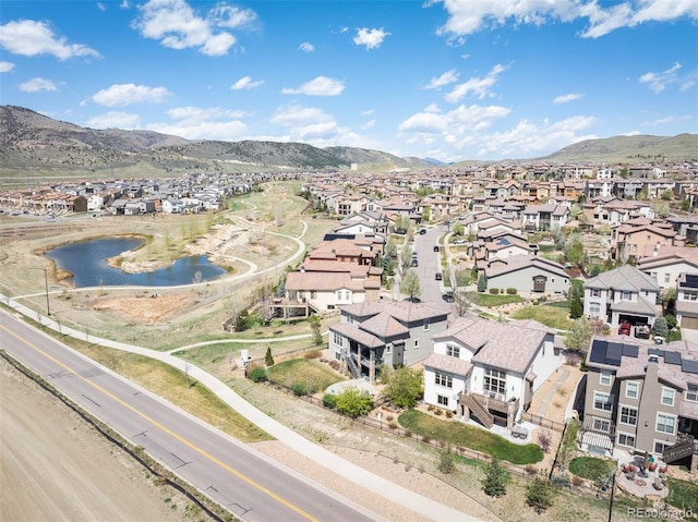 15194 W Washburn Ave, Lakewood, CO 80228 - aerial perspective of suburban area with a water and mountain view