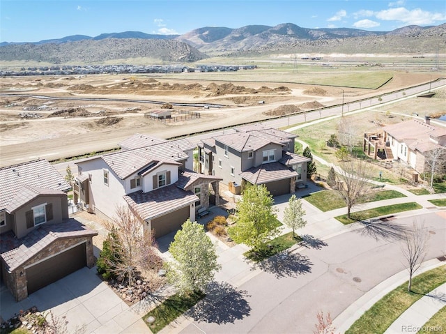 15194 W Washburn Ave, Lakewood, CO 80228 - aerial view of property and surrounding area featuring a mountainous background