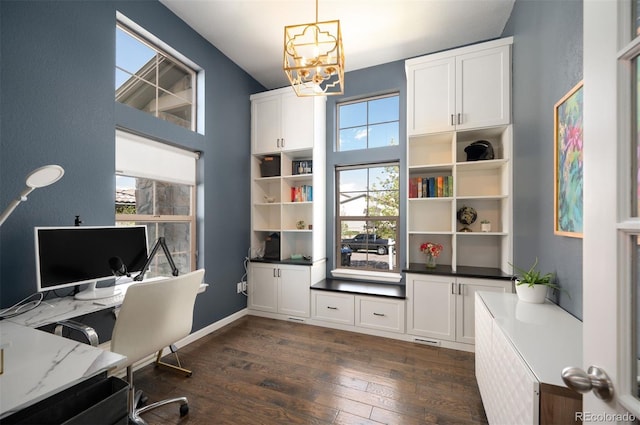 15194 W Washburn Ave, Lakewood, CO 80228 - office area with a chandelier and dark wood-style flooring