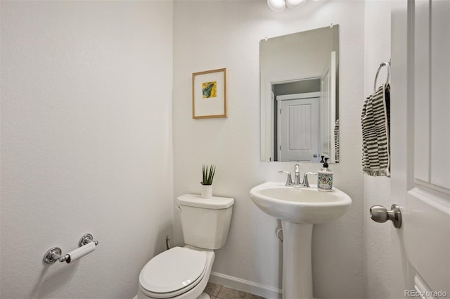 15194 W Washburn Ave, Lakewood, CO 80228 - half bathroom featuring toilet and a sink