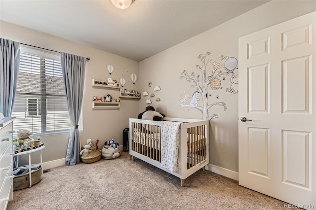 16057 E 47th Pl, Denver, CO 80239 - bedroom with carpet flooring, a crib, and baseboards