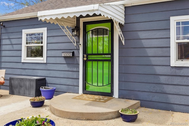 1995 Xenia St, Denver, CO 80220 - entrance to property with a shingled roof