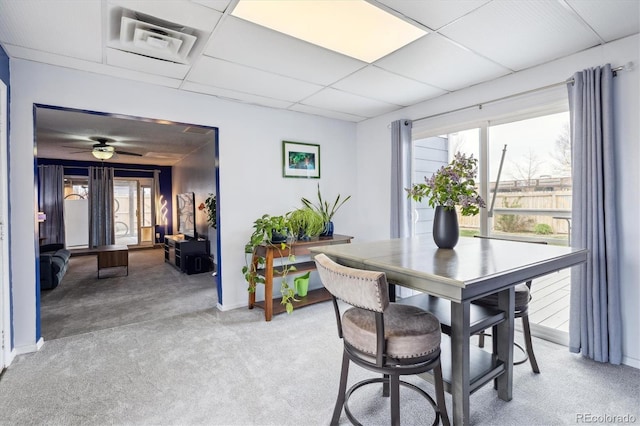 1995 Xenia St, Denver, CO 80220 - dining space with baseboards, visible vents, and light carpet