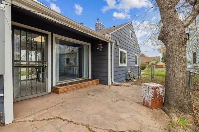 1995 Xenia St, Denver, CO 80220 - exterior space with a gate and fence