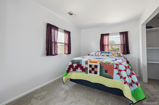 1995 Xenia St, Denver, CO 80220 - bedroom featuring carpet flooring, baseboards, visible vents, and ornamental molding