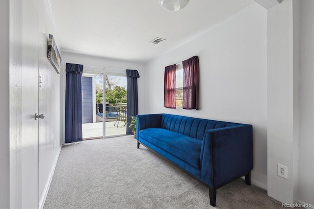 1995 Xenia St, Denver, CO 80220 - living area featuring carpet floors, baseboards, and visible vents