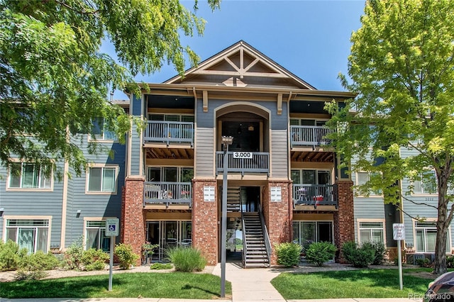 804 Summer Hawk Dr Unit 3202, Longmont, CO 80504 - view of building exterior featuring stairs