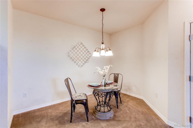 804 Summer Hawk Dr Unit 3202, Longmont, CO 80504 - carpeted dining area with a chandelier and baseboards