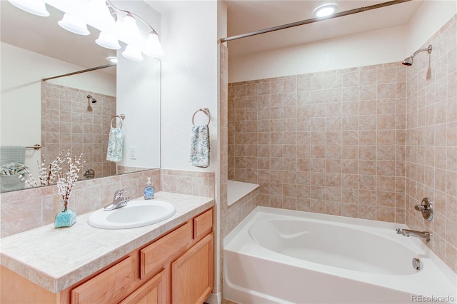 804 Summer Hawk Dr Unit 3202, Longmont, CO 80504 - full bathroom with vanity, shower / washtub combination, and tasteful backsplash