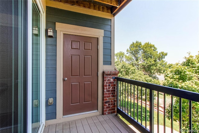 804 Summer Hawk Dr Unit 3202, Longmont, CO 80504 - property entrance featuring a balcony and brick siding