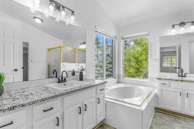 524 Rider Ridge Dr, Longmont, CO 80504 - full bath featuring a wealth of natural light, lofted ceiling, and a sink