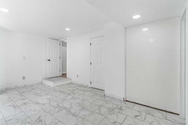 524 Rider Ridge Dr, Longmont, CO 80504 - unfurnished room featuring baseboards, marble finish floor, and recessed lighting