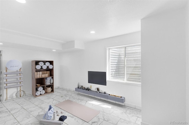 524 Rider Ridge Dr, Longmont, CO 80504 - exercise room with baseboards, marble finish floor, and recessed lighting